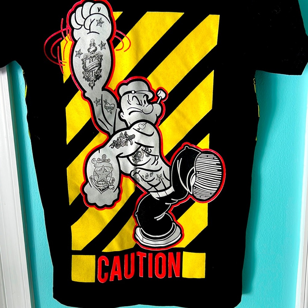 Popeye tee size small so!!! Cute!! Excellent condition